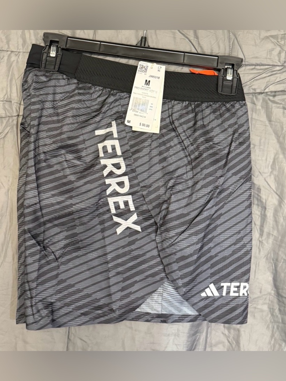ADIDAS LIGHTWEIGHT TRAIL RUNNING SHORTS WITH RECYCLED MATERIALS.